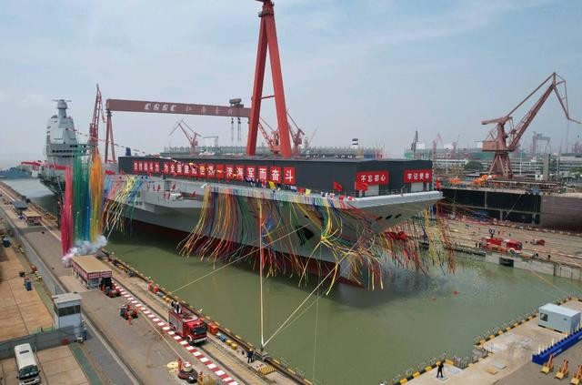 福建舰下水和首颗氢弹爆炸成功是同一天