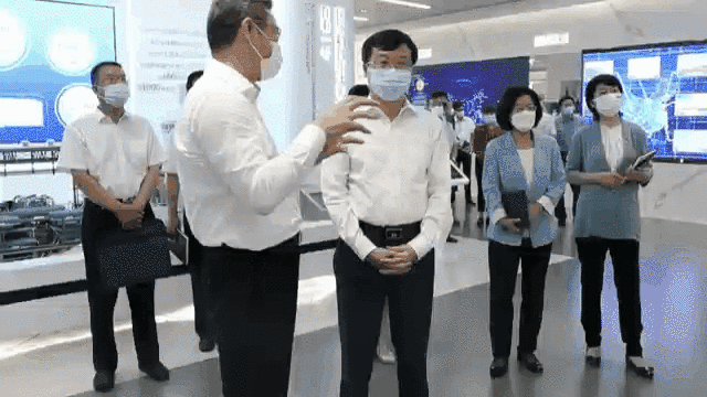 人民日报社副总编辑王一彪一行到国家电投座谈交流