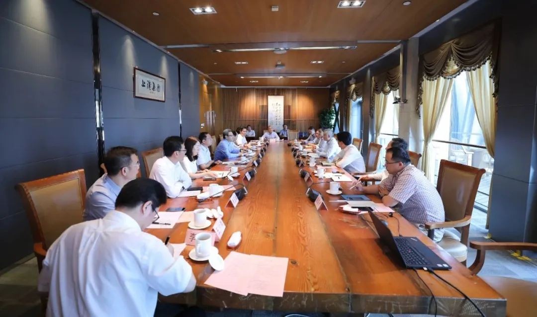 钱智民与上港集团董事长顾金山会谈