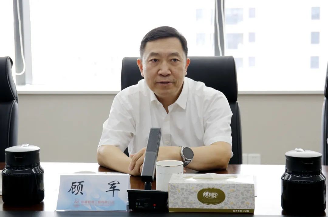 顾军调研中国核建在沪单位