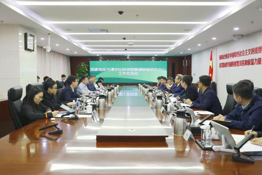 钱智民会见何继江