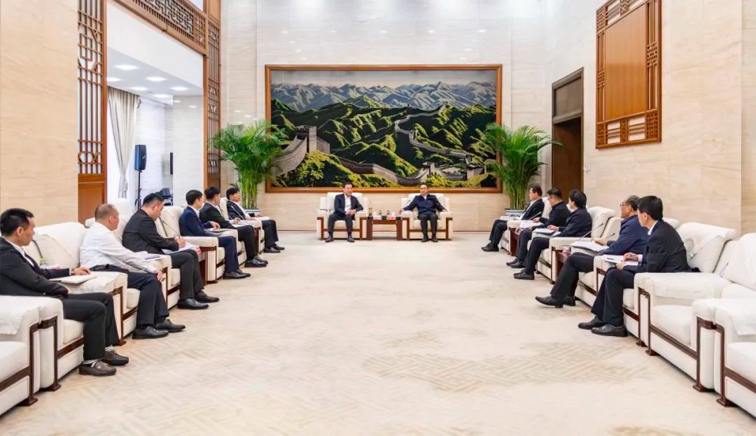 邹磊与明阳集团董事长张传卫会谈